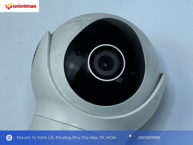 Kiểm tra vỏ máy, ống kính và dấu hiệu sửa chữa trước khi cấp nguồn